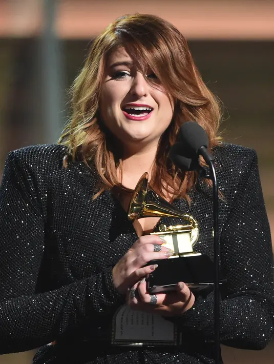 “Itu adalah bagian terbaik dari masa kecilku. Saya ingat suatu malam kita semua pergi keluar, aku tidak peduli apa yang dipikirkan orang-orang dewasa, aku hanya menari mengikuti hati. Ia (ayah) mengilhami saya.'' ungkap Meghan Trainor. (AFP/Bintang.com)