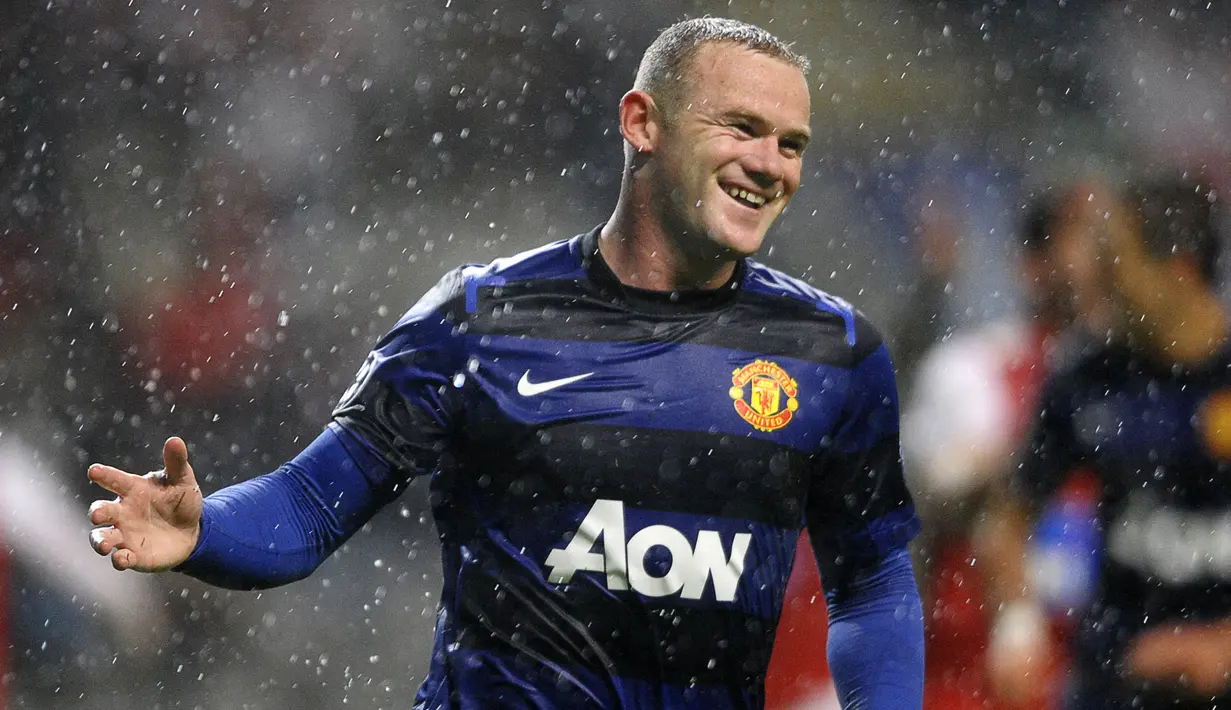 Pencetak gol tandang terbanyak di Liga Inggris adalah Wayne Rooney, dengan koleksi 94 gol. Ia juga tercatat sebagai pencetak gol terbanyak kedua di liga setelah Alan Shearer. Rooney mengumpulkan banyak koleksi trofi dalam 13 tahunnya bersama Setan Merah. (AFP/Miguel Riopa)
