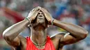 Ekspresi atlet Kenya, Nicholas Bett setelah memenangi final lari 400m gawang putra Kejuaraan Dunia Atletik 2015 di Stadion Nasional, Beijing, Tiongkok. (25/8/2015). (Reuters/Lucy Nicholson)