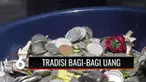 Peringatan Maulid Nabi di Madiun ini memicu kerumunan warga yang saling berdesakan dalam tradisi bagi-bagi uang.