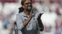 Klopp yakin Liverpool finis di empat besar. (AFP / DANIEL LEAL-OLIVAS)