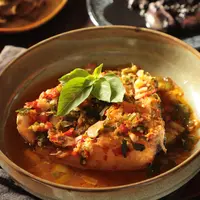 Resep ikan woku manado./Copyright&nbsp;shutterstock.com/g/AriyaniTedjo