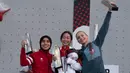 Sementara, di Final Speed Putri Panjat Tebing Seri Kualifikasi Olimpiade 2024, Rajiah Salbillah (kiri) harus puas dengan medali perak. (AP Photo/Ng Han Guan)