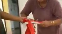 Video aksi menggunting bendera merah putih yang dilakukan seorang ibu di Sumerang viral di media sosial. (Liputan6.com/ Ist)