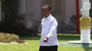 Ekspresi mantan Ketua Umum Himpunan Pengusaha Muda Indonesia (HIPMI) Bahlil Lahadalia saat tiba di Istana, Jakarta, Selasa (22/10/2019). Bahlil dipanggil Presiden Joko Widodo atau Jokowi untuk menempati salah satu pos kementerian di Kabinet Kerja Jilid II. (Liputan6.com/Angga Yuniar)