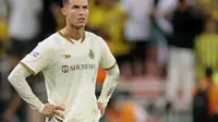 Penyerang Al-Nassr Cristiano Ronaldo tampak kecewa dalam pertandingan Liga Arab Saudi melawan Al-Ittihad di Stadion King Abdullah Sport City, Jeddah, Jumat (10/3/2023) dini hari WIB. Al-Nassr kalah 0-1 dari Al-Ittihad. (AFP)