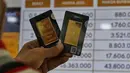 Pada Rabu (14/5/2025), harga emas Galeri 24 untuk berat 1 gram dijual dikisaran Rp1,907 juta atau turun Rp14 ribu dibandingkan Selasa (13/5/2025). Dan harga emas buatan UBS turun Rp15.000 dari semula Rp1.929.000 per gram menjadi Rp1.914.000  per gram. (Liputan6.com/Angga Yuniar)