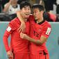 Son Heung-min menangis usai dirinya mampu memberi umpan yang mampu dikonversikan olehrekan satu timnya menjadi gol kemenangan atas Portugal. (AFP/Jung Yeon-je)