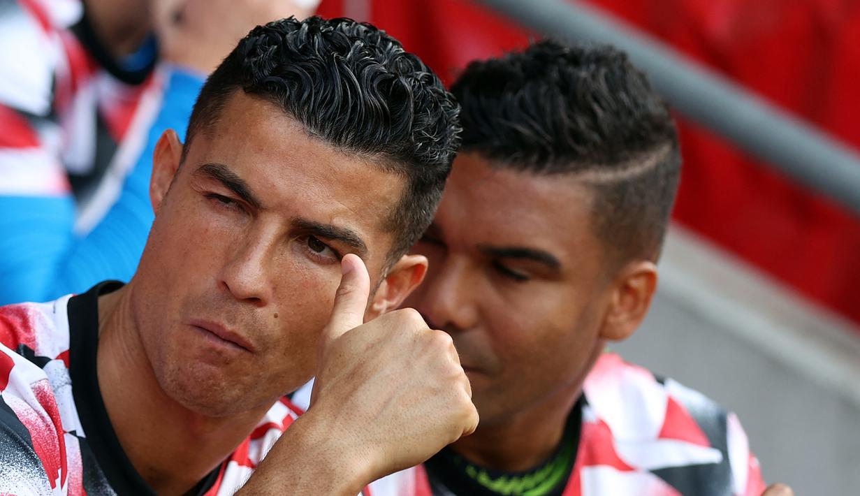 Hal ini tak lepas dari kesimpangsiuran nasib Cristiano Ronaldo yang masih berhasrat pergi dari Old Trafford usai Setan Merah tak lolos ke Liga Champions musim ini. (AFP/Adrian Dennis)