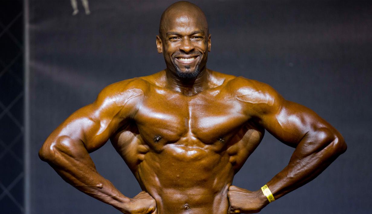 Ekspresi salah satu binaragawan asal Haiti Pierrive Lindon saat berkompetisi di Port-au-Prince, Haiti, Minggu (23/7). Acara ini diselenggarakan oleh kelompok binaraga setempat untuk memberi dukungan di bidang olahraga tersebut. (AP/Dieu Nalio Chery)