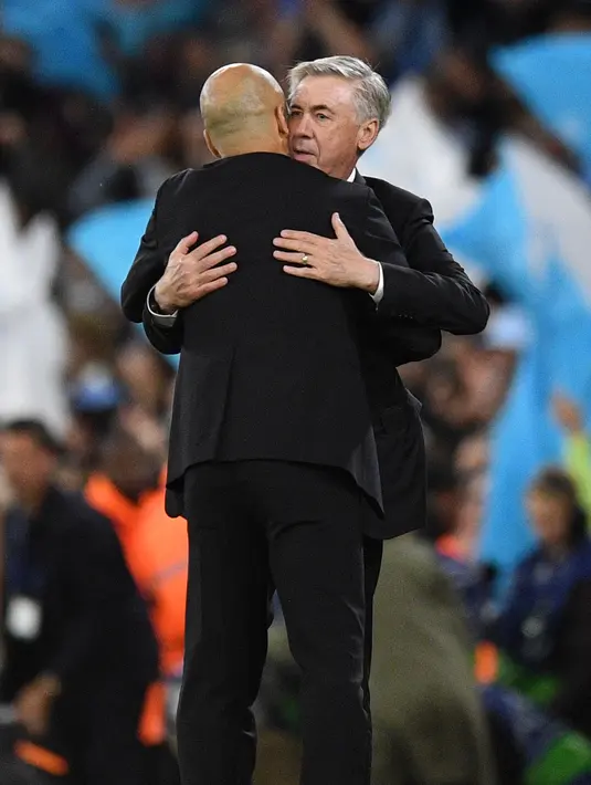 Kontrak Ancelotti sendiri masih ada hingga 2024. Itu berarti, dirinya masih bisa bertahan satu tahun lagi di Santiago Bernabeu. Ancelotti bertekad membalas kegagalan di musim ini di musim depan. "Musim depan saya masih akan ada di sini untuk berjuang memenangkan Liga Champions lagi," kata dia. (AFP/Oli Scarff)