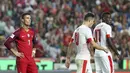 Striker Portugal, Cristiano Ronaldo, termenung usai gagal membobol gawang Swiss pada laga kualifikasi Piala Dunia 2018 di Stadion Luz, Selasa (10/10/2017). Portugal menang 2-0 atas Swiss.(AP/Armando Franca)