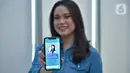 Model menunjukkan fitur terbaru E-Consultation dalam Garda Mobile Medcare di Jakarta, Kamis (16/09/2021). Fitur terbaru asuransi kesehatan dari Garda Medika memungkinkan peserta dapat konsultasi secara online melalui video call dengan dokter umum maupun spesialis. (Liputan6.com/HO/Medika)