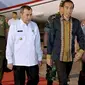 Presiden Joko Widodo didampingi Gubernur Riau Syamsuar ketika mendarat di Pekanbaru untuk memantau Karhutla dan kabut asap. (Liputan6.com/Istimewa/M Syukur)