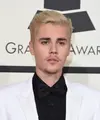  Selebriti yang mendunia,Justin Drew Bieber mantan kekasih dari Selena Gomez ini Nampak hadir di Grammy Award yang digelar di Los Angeles. (AFP/Bintang.com)