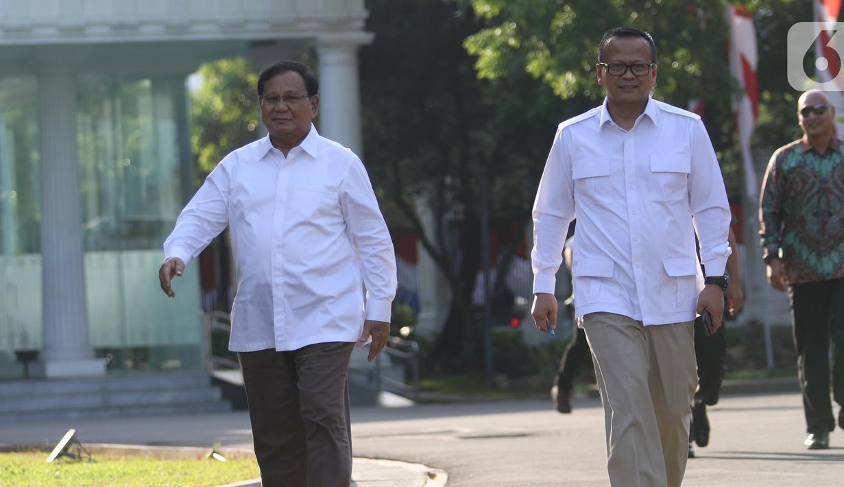Ketua Umum Partai Gerindra Prabowo Subianto (kiri) didampingi Wakil Ketua Umum Partai Gerindra, Edhy Prabowo berjalan memasuki kompleks Istana Kepresidenan, Jakarta, Senin (21/10/2019).  Kedatangan Prabowo ke Istana memenuhi undangan dari Presiden Jokowi. (Liputan6.com/Angga Yuniar)