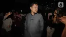 Ketika ditanya wartawan usai diperiksa KPK, Ketua Bidang Ekonomi Pengurus Besar Nahdlatul Ulama (PBNU), Aizzudin Abdurrahman (AIZ) membantah menerima uang dalam kasus dugaan korupsi kuota dan penyelenggaraan haji. Tampak dalam foto, Ketua Bidang Ekonomi Pengurus Besar Nahdlatul Ulama (PBNU), Aizzudin Abdurrahman (AIZ) berjalan meninggalkan Gedung Merah Putih Komisi Pemberantasan Korupsi (KPK) usai menjalani pemeriksaan, Jakarta, Selasa (13/1/2026). (Liputan6.com/Helmi Fithriansyah)