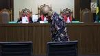 Kurnia Alexander Muskitta saat menjalani sidang pembacaan dakwaan di Pengadilan Tipikor, Jakarta, Rabu (14/8/2019). Kurnia Alexander Muskitta didakwa menjadi perantara suap mantan Direktur Produksi dan Teknologi Krakatau Steel, Wisnu Kuncoro. (Liputan6.com/Helmi Fithriansyah)