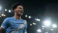 Gelandang Manchester City, Nico O’Reilly merayakan gol kedua timnya dalam pertandingan sepak bola Liga Inggris antara Manchester City dan Fulham di Stadion Etihad, Manchester, Inggris barat laut, pada 11 Februari 2026. (Paul ELLIS / AFP)