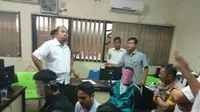 Dua terduga teroris asal Pekanbaru Riau yang ditangkap anggota Densus 88 dan Polda Sumsel ( Liputan6.com / ist -  Nefri Inge)