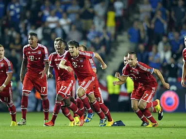 Pemain Bayern Muenchen berselebrasi merayakan kemenangan (AFP/Odd Andersen)