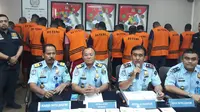 26 warga negara (WN) Afrika yang diduga melakukan praktik Cyber Crime, diamankan Kantor Imigrasi Klas I Tangerang. (Liputan6.com/Pramita Tristiawati)