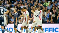 Penyerang Paris Saint-Germain (PSG), Ousmane Dembele, merayakan gol yang dicetaknya ke gawang Le Havre dalam laga pekan perdana Ligue 1 Prancis di Stade Oceane, Havre, Sabtu (17/8/2024). PSG menang 4-1 dalam pertandingan ini. (LOU BENOIST / AFP)