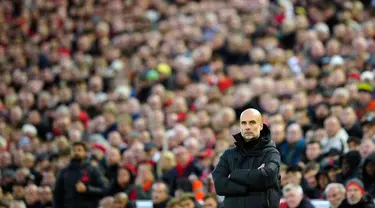 Pelatih Manchester City, Pep Guardiola terlihat kecewa saat pertandingan sepak bola Liga Inggris antara Liverpool dan Manchester City di Stadion Anfield, Liverpool, Minggu (16/10/2022). Ini merupakan kekalahan pertama City di Liga Inggris musim ini. (AP Photo/Jon Super)