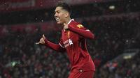 Penyerang Liverpool, Roberto Firmino mengukir namanya pada daftar top scorer sementara Liga Champions dengan koleksi tujuh gol. (Anthony Devlin/PA via AP)