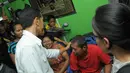 Usai mengunjungi Abdullah, Jokowi menyambangi kediaman Umar, buruh purnakerja yang mengalami stroke (Liputan6.com/Herman Zakharia)
