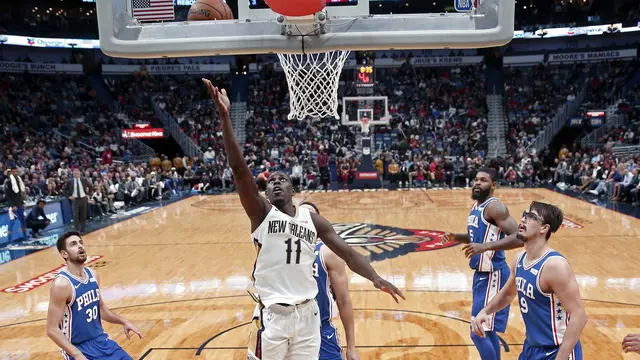 Aksi Jrue Holiday