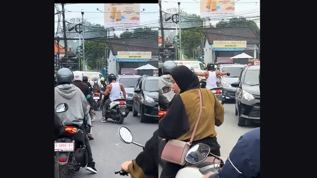 Bule Mengangkat Barbel Saat Kemacetan