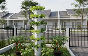 Ide Model Kebun Sayur Mini Dengan Kombinasi Vertical Tower System (Foto: AI)