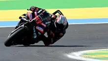 Pembalap Aprilia Racing Team, Marco Bezzecchi, berhasil meraih podium juara di MotoGP Amerika Serikat 2026 yang berlangsung di Circuit of the Americas (COTA), Austin, Senin (30/3/2026) dini hari WIB. (AFP/EVARISTO SA)