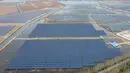 Foto dari udara menunjukkan panel-panel surya fotovoltaik di Sheyanghu di Wilayah Baoying, Provinsi Jiangsu, China timur (5/11/2020). Saat ini, wilayah tersebut memiliki panel-panel surya fotovoltaik yang mencakup area seluas lebih dari 4.000 hektare. (Xinhua/Li Bo)