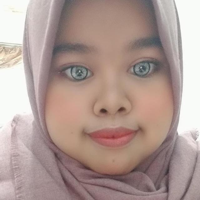 Tampil Beda, Ini 6 Potret Kekeyi Pakai Softlens Abu-abu yang Curi Perhatian