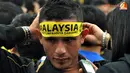 Suporter Laga Pertandingan Piala AFF Suzuki 2012 antara Malaysia vs Indonesia di Stadion Bukit Jalil, Kuala Lumpur, Malaysia, pada 1 November 2012.