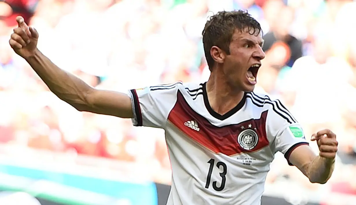 Di laga perdana babak penyisihan Piala Dunia 2014 Grup G melawan Portugal, (16/6/2014), Thomas Mueller tampil impresif dengan mencetak tiga gol, salah satunya lewat titik putih. (REUTERS/Dylan Martinez)