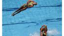  Para perenang indah asal Ukraina beraksi pada Olympic Games Kualifikasi Olympic Games Turnamen di Rio de Janeiro, Brasil, Sabtu (5/3/2016). (REUTERS/Sergio Moraes)