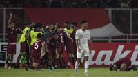 Gelandang Timnas Indonesia, Saddil Ramdani, tampak kecewa usai dibobol Qatar pada laga AFC U-19 Championship di SUGBK, Jakarta, Minggu (21/10). Indonesia kalah 5-6 dari Qatar. (Bola.com/Vitalis Yogi Trisna)