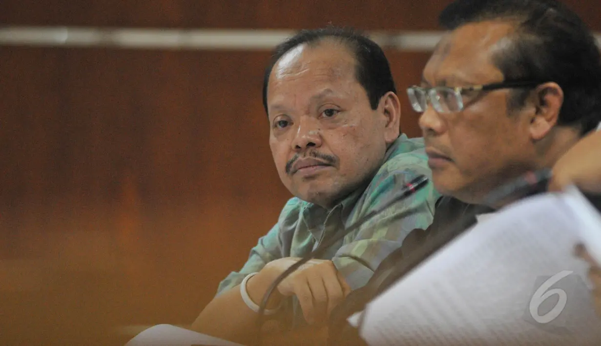 Terdakwa kasus dugaan penerimaan hadiah atau janji terkait penetapan APBN-Perubahan Kementerian ESDM, Sutan Bhatoegana  menjalani sidang lanjutan di Pengadilan Tipikor, Jakarta, Senin (18/5/2015). (Liputan6.com/Herman Zakharia)