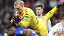 Robin Zentner. Kiper asal Jerman berusia 27 tahun yang kini memasuki musim ke-8 bersama FSV Mainz 05 ini sementara menjadi kiper dengan torehan clean sheet terbanyak di Liga Jerman musim 2021/2022. Ia telah mencetak 8 kali clean sheet musim ini dari total 23 laga. (AFP/Daniel Roland)