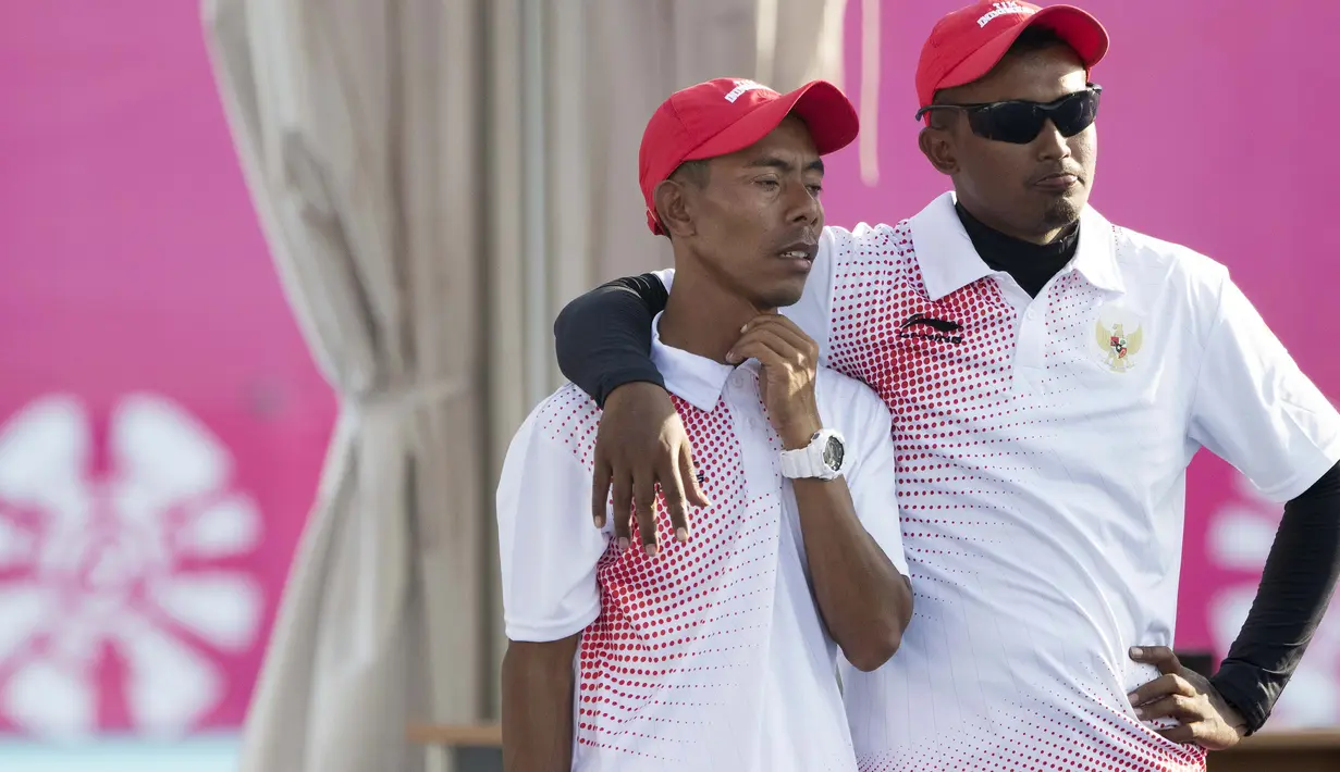 Kacung atlet Lawnball Indonesia bertanding di nomor B2 Open Single's pada Asian Para Games 2018 di Stadion Hockey, Gelora Bung Karno Jakarta, Senin (8/10/2018).  (Bola.com/Peksi Cahyo)