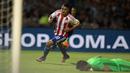 Ekspresi pemain Paraguay, Derlis Gonzalez, setelah mencetak gol ke gawang Argentina dalam laga Kualifikasi Piala Dunia 2018 zona Amerika Selatan, di Stadion Mario Kempes, Cordoba, Rabu (12/10/2016) pagi WIB. (AFP/Juan Mabromata)