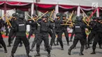 Atraksi bela diri Eskrima Brimob dalam HUT ke-73 Bhayangkara di Monas, Jakarta, Rabu (10/7/2019). HUT ke-73 Bhayangkara ini bertemakan ‘Dengan Semangat Promoter, Pengabdian Polri untuk Masyarakat, Bangsa dan Negara. (Liputan6.com/Faizal Fanani)