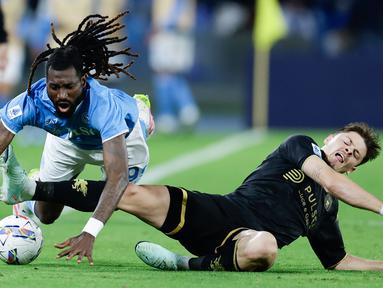 Perebutan gelar juara Serie A musim ini semakin mendebarkan menjelang akhir kompetisi. Hanya tersisa dua pertandingan, dan jarak antara Napoli dan Inter Milan kini hanya satu poin. (Alessandro Garofalo/LaPresse via AP)