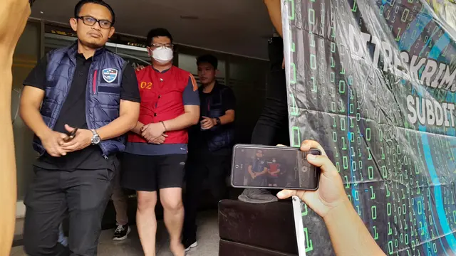 Tersangka penipuan QRIS Palsu, Mohammad Iman Mahlil Lubis (Liputan6.com/ Ady Anugrahadi)