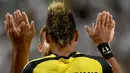 Gaya rambut Pierre-Emerick Aubameyang saat melakukan selebrasi usai mencetak gol ke gawang Legia Warsawa saat bertanding di Liga Champions pada 14 September 2016. (AFP Photo/Janek Skarzynski)