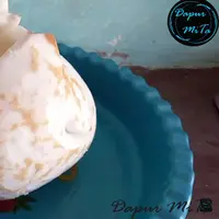 Kelapa yang sudah dikupas dan dicuci bersih sebelum diparut (YouTube/Campur MiTa)