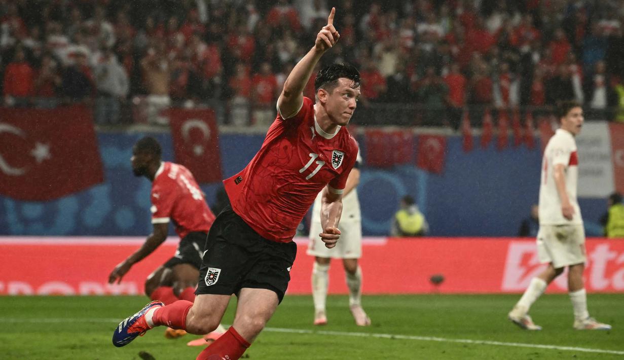 Austria memperkecil ketinggalan berkat gol Michael Gregoritsch pada menit ke-66. (Angelos Tzortzinis/AFP)